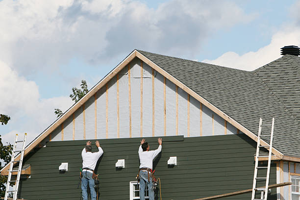 Professional Siding technician working in Lockport, NY